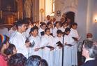 Koptische Minestranten in St. Ephrem singen zur Ehre der Verleihung des Prof. Titels an Aydin
